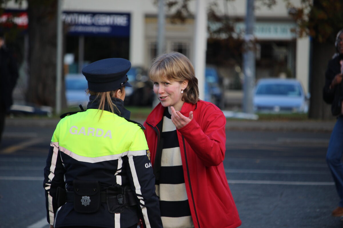 Martha Ní Riada speaks with Gardaí at UCDSU N11 Flyover Protest
